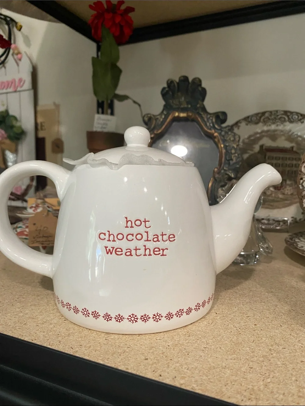 White Ceramic Teapot with Red 'Hot Chocolate Weather' Accent